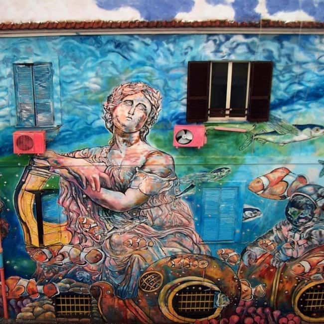 Art & Craft: Beer Tour with Street Art in Rome - Via del Pigneto murals: Atoche and Solo on the first stretch