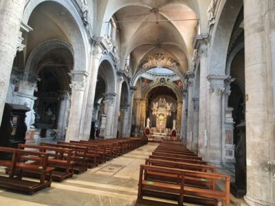 Rome: Caravaggio Guided Walking Tour - Entering Basilica Santa Maria del Popolo and spotting two Caravaggio scenes