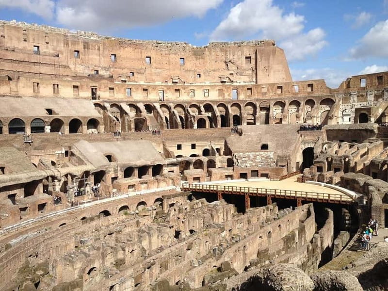 Rome: Colosseum, Roman Forum, and Palatine Hill Guided Tour - Entering the Colosseum With a Licensed English Guide