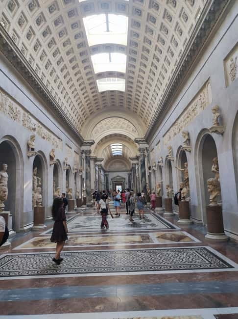 Rome: Majesty of the Vatican Small-Group Walking Tour - Vatican Museums: 105 Minutes of Raphael to Apollo