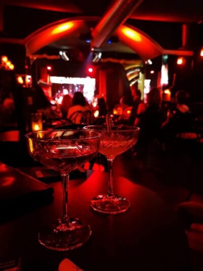 Rome: Night Life Walking Tour and Burlesque Show Entry - Quartiere San Lorenzo walk: Roman myths with your first drink in hand