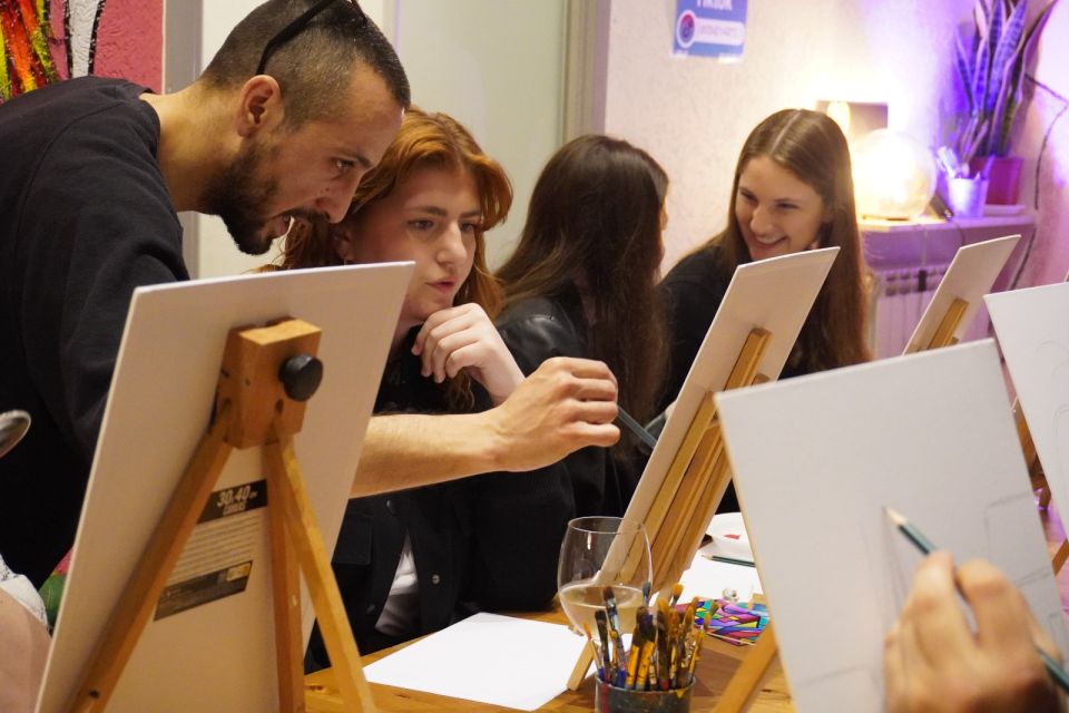 Rome: Wine and Paint Experience in Piazza Navona - Inside the Studio: Canvas, Supplies, and a 17th-Century Feel